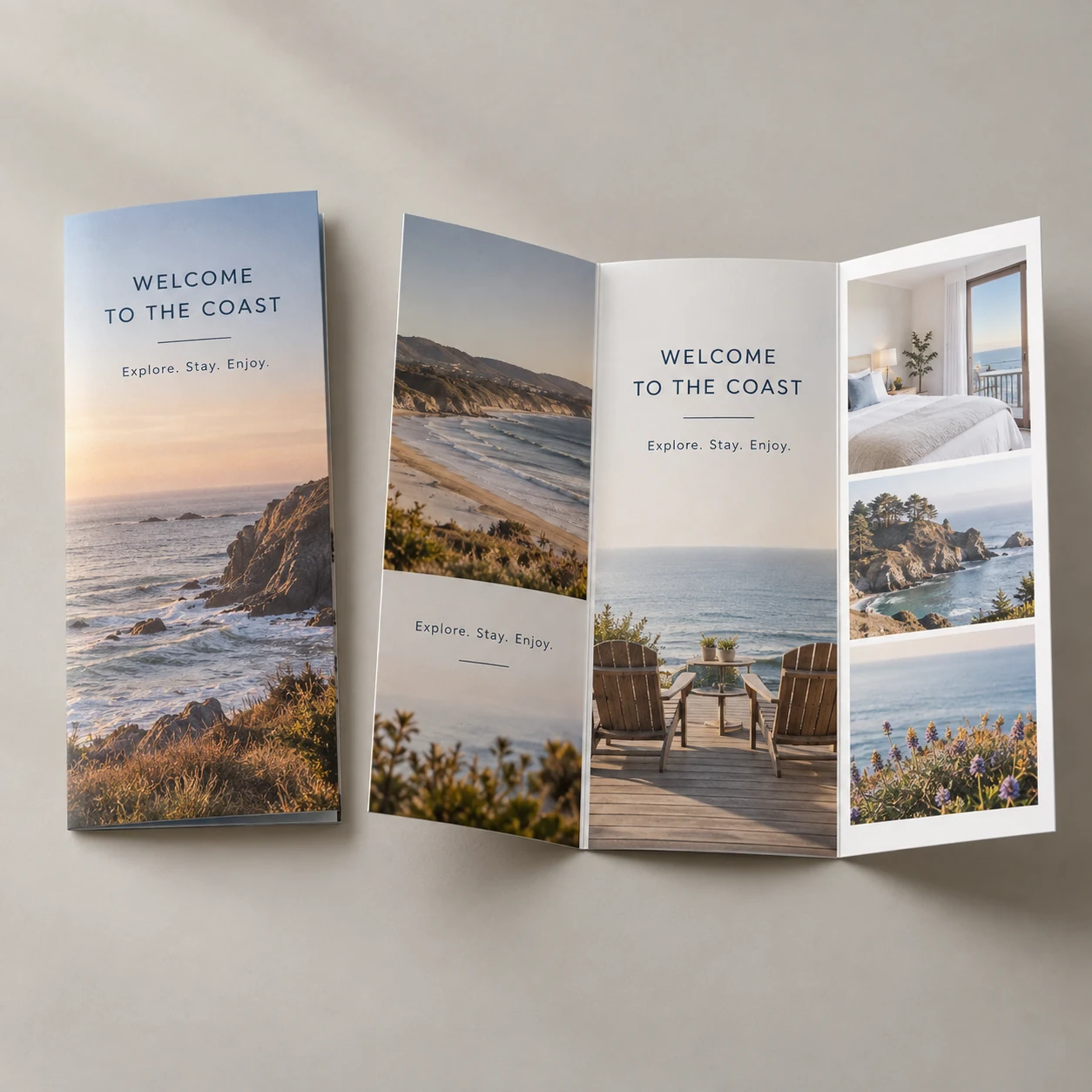 Coastal travel tri-fold brochure on a light studio surface
